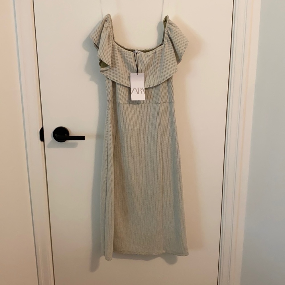 White with green dots dress